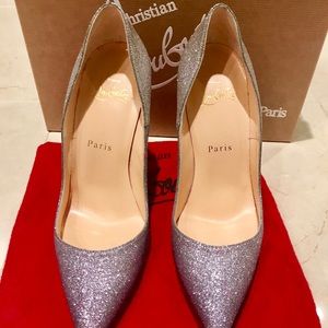 Christian Louboutin silver heels. Size 7.